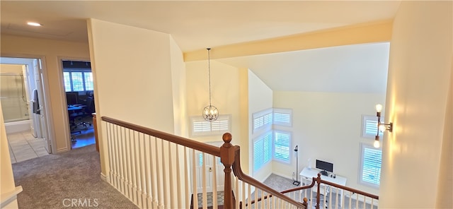 27324 Chesterfield Dr, Valencia, CA 91354 - hallway featuring an upstairs landing, healthy amount of natural light, carpet, and a chandelier