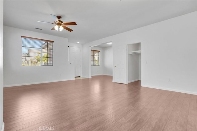 62 Rio Grande St, Fillmore, CA 93015 - unfurnished living room with ceiling fan, light wood-style floors, and baseboards