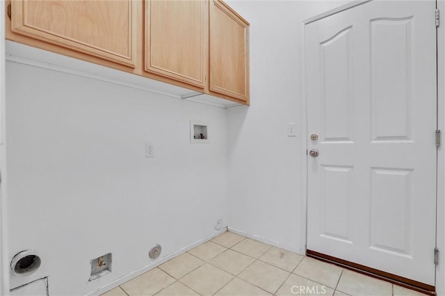 62 Rio Grande St, Fillmore, CA 93015 - laundry area with cabinet space, washer hookup, gas dryer hookup, light tile patterned floors, and baseboards