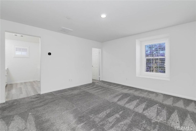 7453 Jersey St, Chino, CA 91708 - carpeted empty room with baseboards and healthy amount of natural light