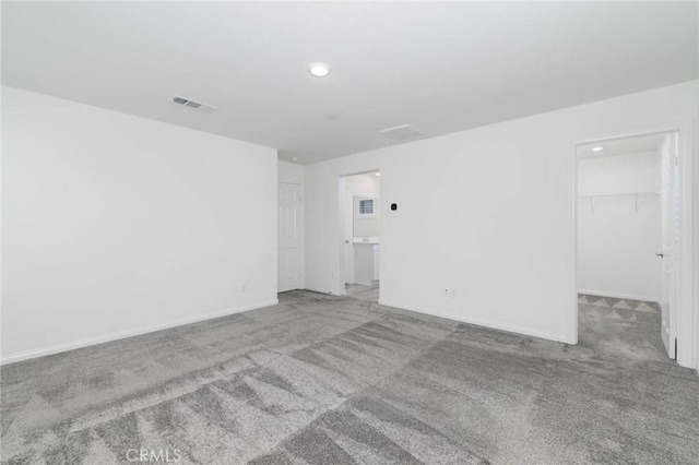 7453 Jersey St, Chino, CA 91708 - empty room with carpet floors, baseboards, and recessed lighting