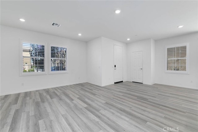 7453 Jersey St, Chino, CA 91708 - unfurnished room with recessed lighting, light wood-style flooring, and baseboards