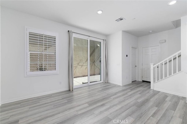 7453 Jersey St, Chino, CA 91708 - unfurnished room with light wood-style floors, healthy amount of natural light, recessed lighting, and baseboards