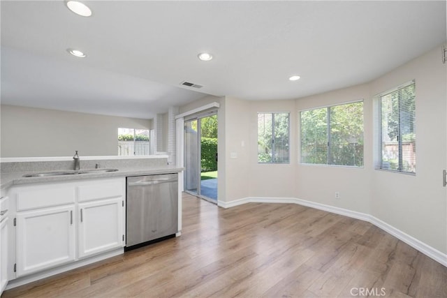 3 Andria, Irvine, CA 92614 - kitchen featuring stainless steel dishwasher, a sink, light wood-style floors, plenty of natural light, and recessed lighting