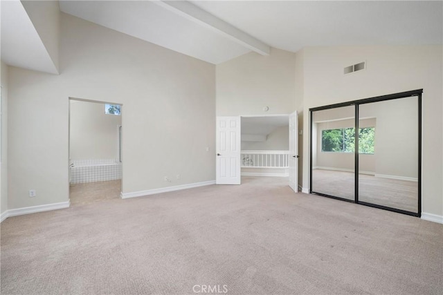 3 Andria, Irvine, CA 92614 - spare room featuring carpet floors, high vaulted ceiling, beamed ceiling, and baseboards