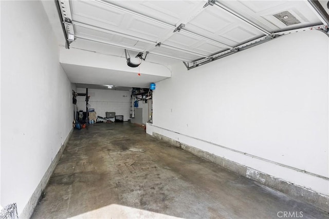 26873 Claudette St Unit 112, Canyon Country, CA 91351 - garage featuring a garage door opener