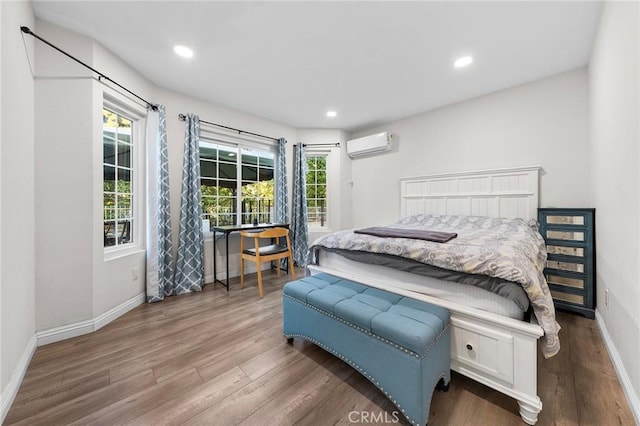 19519 Greenwillow Ln, Rowland Heights, CA 91748 - bedroom with a wall mounted AC, wood finished floors, multiple windows, baseboards, and recessed lighting