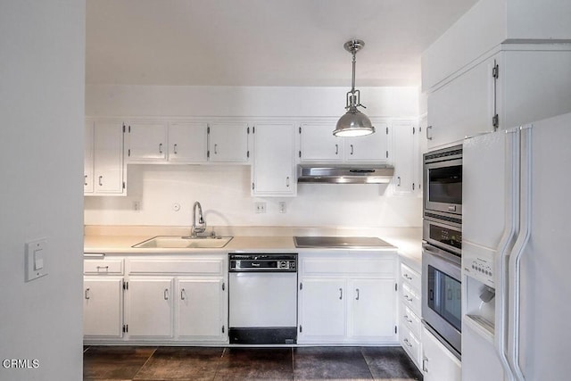 631 Wilcox Ave Unit 2E, Los Angeles, CA 90004 - kitchen with stainless steel appliances, a sink, under cabinet range hood, and white cabinets