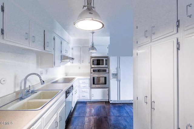 631 Wilcox Ave Unit 2E, Los Angeles, CA 90004 - kitchen featuring stainless steel appliances, a sink, under cabinet range hood, and light countertops