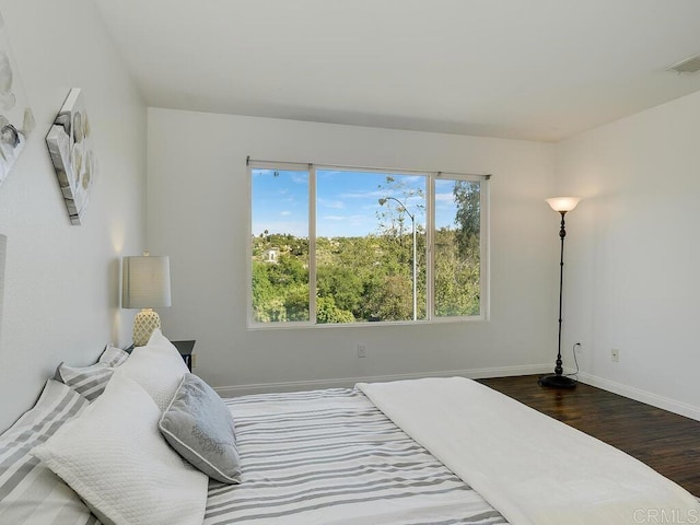 11615 Trailbrook Ln, San Diego, CA 92128 - bedroom with dark wood-style flooring and baseboards
