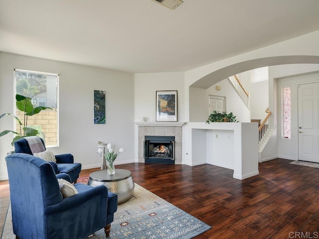 11615 Trailbrook Ln, San Diego, CA 92128 - living room with wood finished floors, a fireplace, stairway, and baseboards