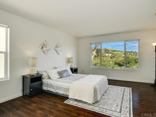 11615 Trailbrook Ln, San Diego, CA 92128 - bedroom with dark wood-type flooring and baseboards