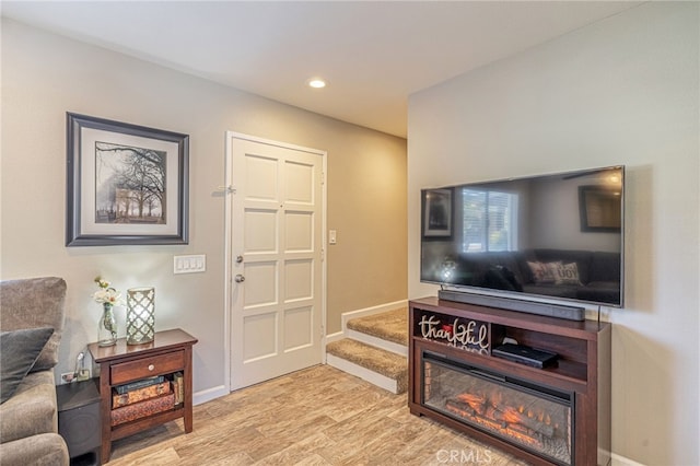 44156 30th St W, Lancaster, CA 93536 - living room featuring light wood-type flooring, baseboards, and recessed lighting