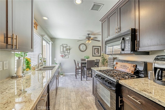 44156 30th St W, Lancaster, CA 93536 - kitchen featuring black appliances, a sink, dark brown cabinets, a ceiling fan, and light wood-style floors