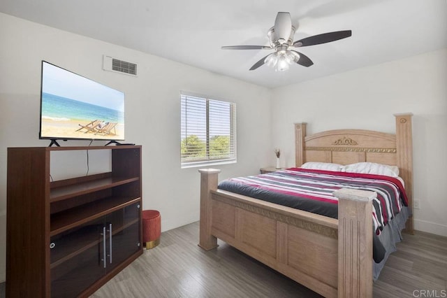 1450 Melrose Ave Unit 25, Chula Vista, CA 91911 - bedroom featuring wood finished floors, baseboards, and ceiling fan