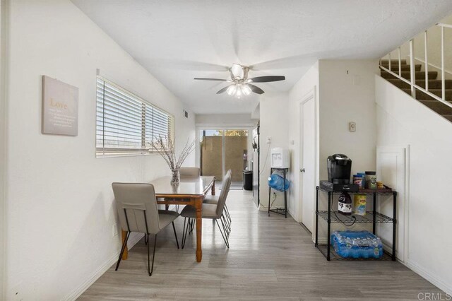 1450 Melrose Ave Unit 25, Chula Vista, CA 91911 - dining area with wood finished floors, ceiling fan, and baseboards