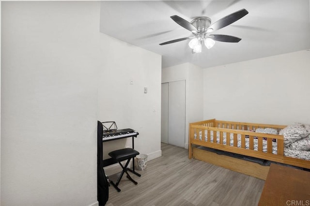 1450 Melrose Ave Unit 25, Chula Vista, CA 91911 - bedroom with wood finished floors, a ceiling fan, baseboards, and a closet