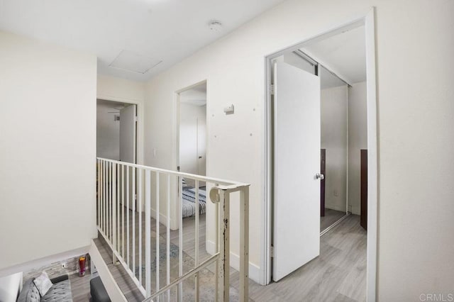 1450 Melrose Ave Unit 25, Chula Vista, CA 91911 - hall featuring attic access and wood finished floors