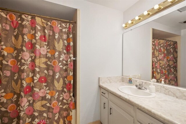 542 Via Estrada Unit A, Laguna Woods, CA 92637 - full bathroom featuring vanity and curtained shower