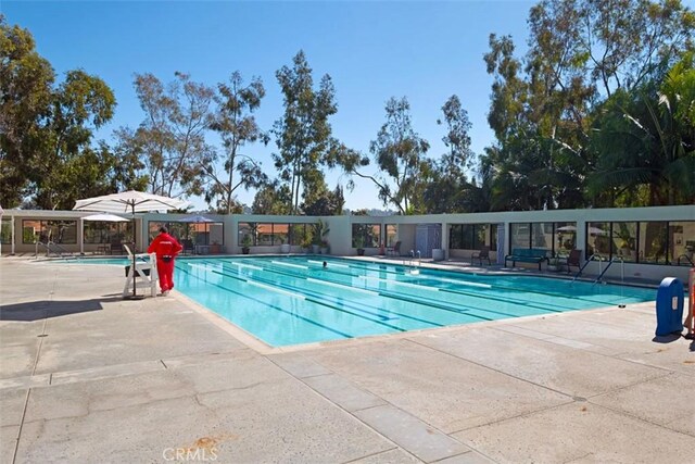542 Via Estrada Unit A, Laguna Woods, CA 92637 - community pool featuring a patio area