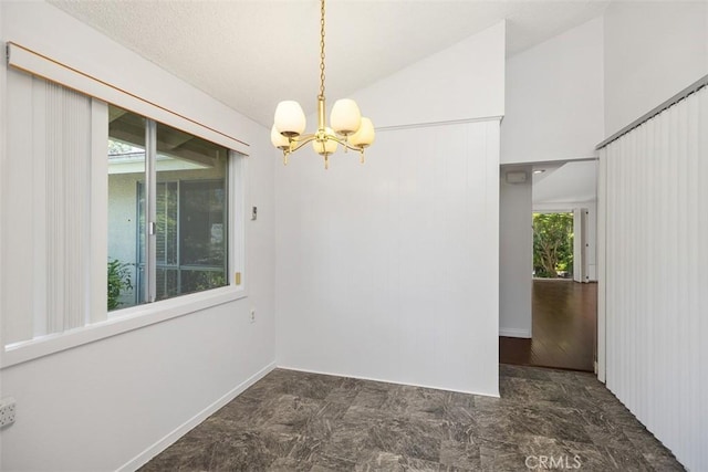 542 Via Estrada Unit A, Laguna Woods, CA 92637 - unfurnished room with a chandelier and vaulted ceiling