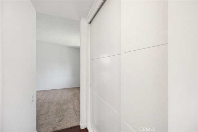 542 Via Estrada Unit A, Laguna Woods, CA 92637 - corridor featuring carpet
