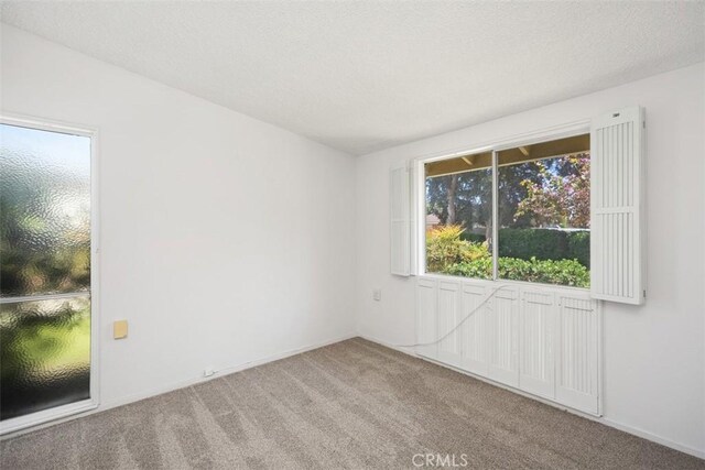 542 Via Estrada Unit A, Laguna Woods, CA 92637 - spare room with carpet floors