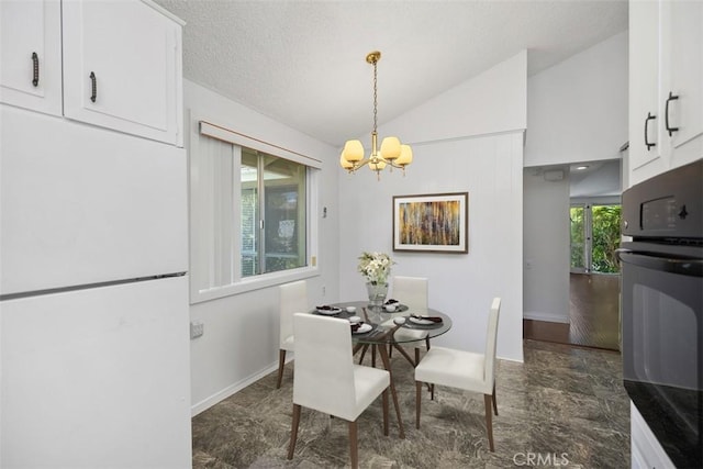 542 Via Estrada Unit A, Laguna Woods, CA 92637 - dining room with a chandelier, vaulted ceiling, baseboards, and a textured ceiling