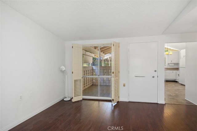 542 Via Estrada Unit A, Laguna Woods, CA 92637 - spare room with wood finished floors and baseboards