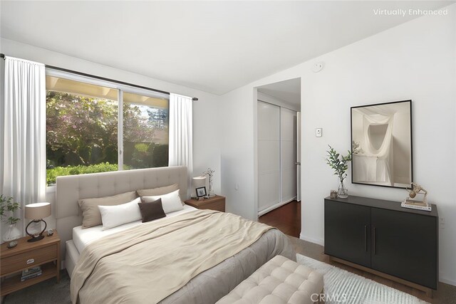 542 Via Estrada Unit A, Laguna Woods, CA 92637 - carpeted bedroom with vaulted ceiling