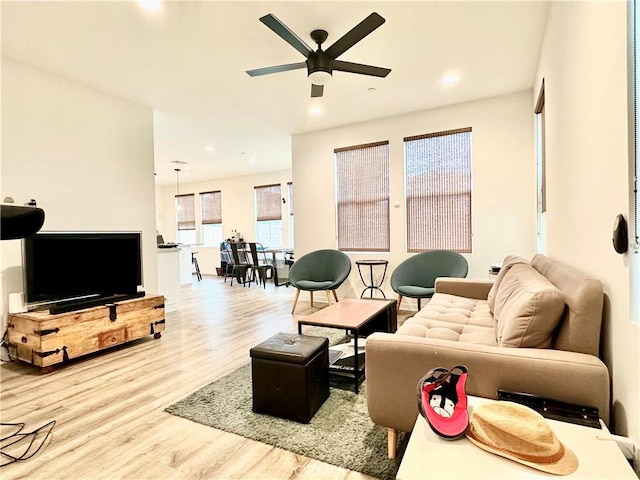 403 Aura Dr, Costa Mesa, CA 92626 - living area featuring wood finished floors, ceiling fan, and recessed lighting