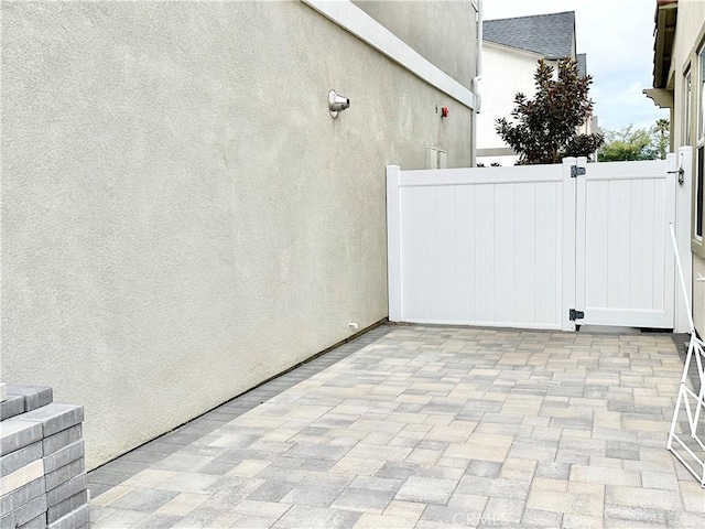 403 Aura Dr, Costa Mesa, CA 92626 - view of patio / terrace with a gate