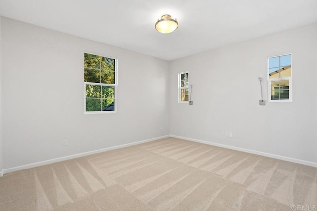 2386 Lapis Rd, Carlsbad, CA 92009 - unfurnished room featuring light carpet and baseboards