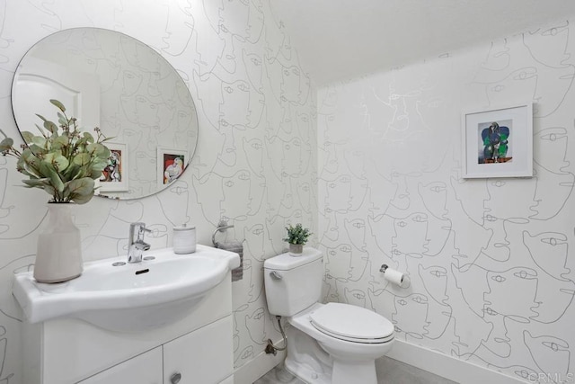 2386 Lapis Rd, Carlsbad, CA 92009 - bathroom featuring wallpapered walls, toilet, and vanity