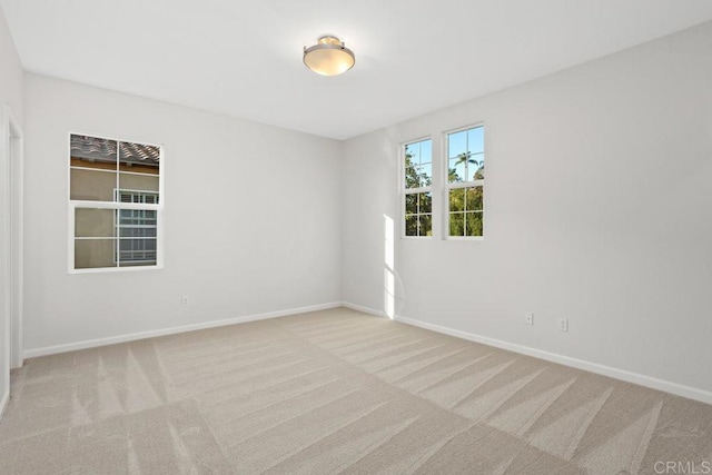 2386 Lapis Rd, Carlsbad, CA 92009 - carpeted spare room featuring baseboards