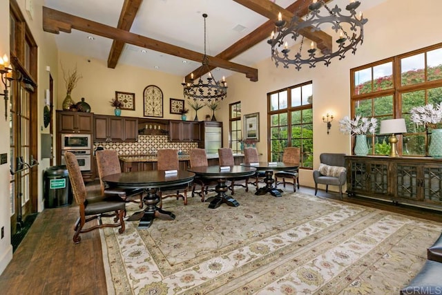 2386 Lapis Rd, Carlsbad, CA 92009 - dining room with a chandelier, beamed ceiling, dark wood-style flooring, and a high ceiling