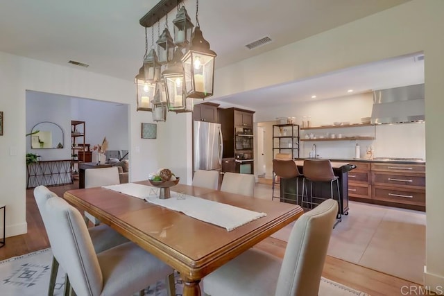 10509 Challenge Blvd, La Mesa, CA 91941 - dining room featuring light wood-type flooring
