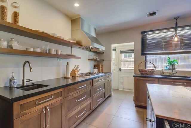 10509 Challenge Blvd, La Mesa, CA 91941 - kitchen with open shelves, a sink, dark countertops, hanging light fixtures, and recessed lighting