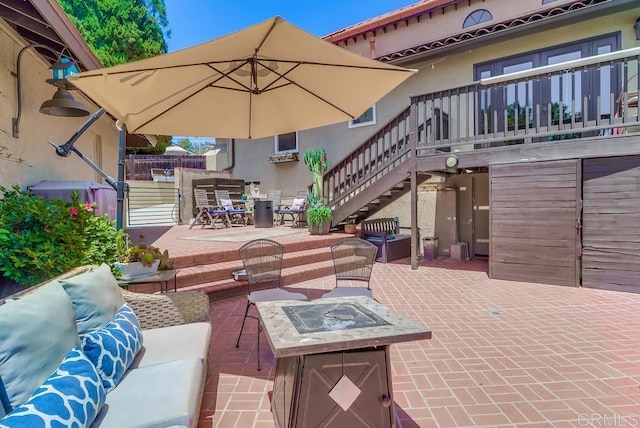 10509 Challenge Blvd, La Mesa, CA 91941 - view of patio / terrace featuring stairway, an outdoor living space with a fire pit, and a gate