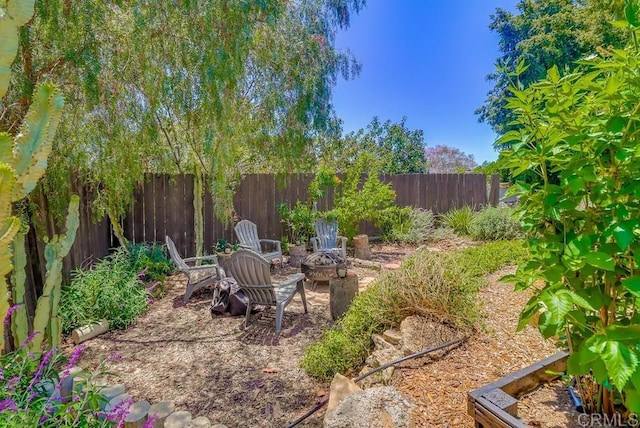 10509 Challenge Blvd, La Mesa, CA 91941 - fenced backyard featuring a fire pit