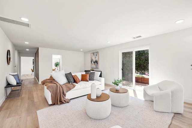 1711 Alhudson Dr, Escondido, CA 92029 - living room featuring light wood-style floors, recessed lighting, and baseboards