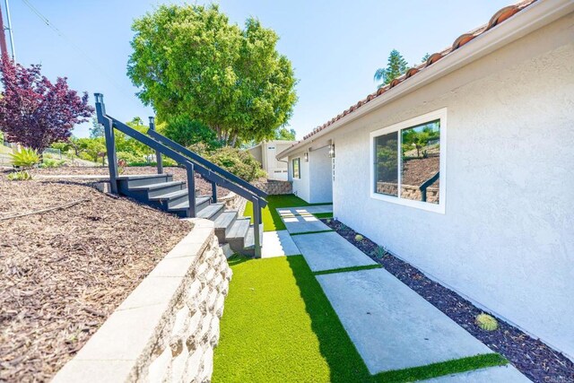 1711 Alhudson Dr, Escondido, CA 92029 - view of grassy yard featuring stairs