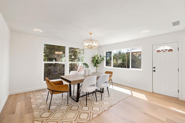 1711 Alhudson Dr, Escondido, CA 92029 - dining space with light wood-style floors, baseboards, and a chandelier