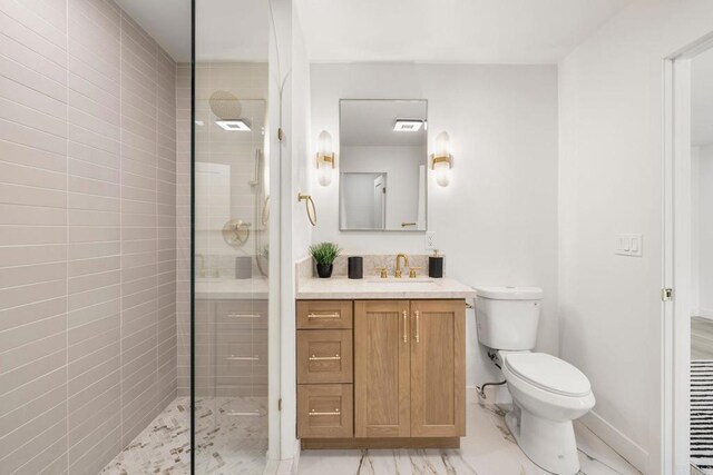 1711 Alhudson Dr, Escondido, CA 92029 - full bath featuring toilet, a tile shower, vanity, and baseboards