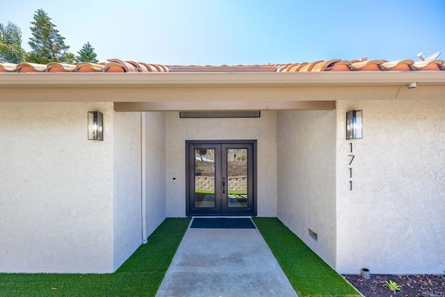1711 Alhudson Dr, Escondido, CA 92029 - view of exterior entry featuring french doors and stucco siding