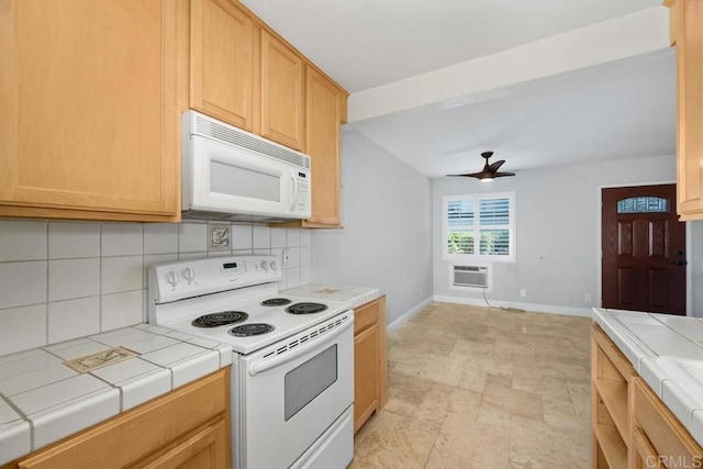 356 S Miraleste Dr Unit 327, San Pedro, CA 90732 - kitchen featuring white appliances, tile counters, decorative backsplash, and baseboards