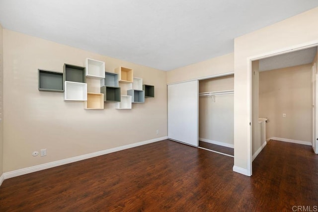 356 S Miraleste Dr Unit 327, San Pedro, CA 90732 - unfurnished bedroom featuring dark wood finished floors, baseboards, and a closet