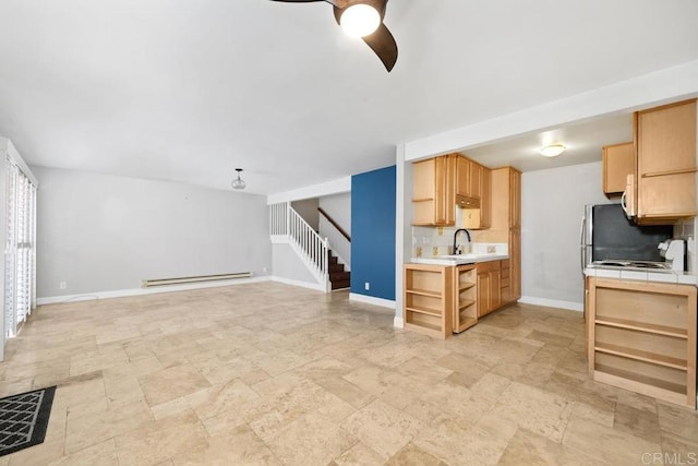 356 S Miraleste Dr Unit 327, San Pedro, CA 90732 - kitchen with open shelves, a baseboard radiator, tile countertops, and stone tile floors