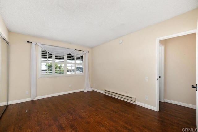 356 S Miraleste Dr Unit 327, San Pedro, CA 90732 - unfurnished bedroom with baseboard heating, wood finished floors, baseboards, and a closet
