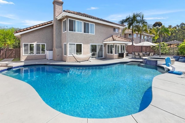 11171 Alejo Pl, San Diego, CA 92124 - view of swimming pool with a patio area, a fenced backyard, outdoor lounge area, and a pool with connected hot tub